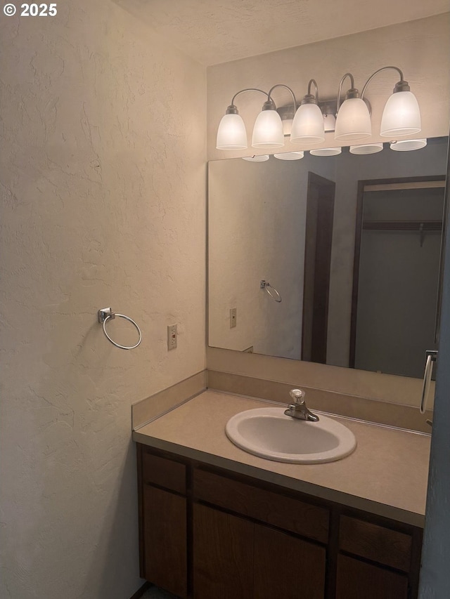 2040 40th St, Florence, OR 97439 - bathroom featuring vanity and a textured wall