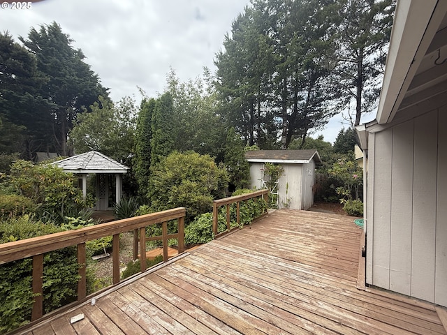 2040 40th St, Florence, OR 97439 - wooden deck with a shed and view of scattered trees
