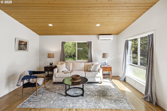 living area with wooden ceiling, healthy amount of natural light, a wall mounted AC, vaulted ceiling, and wood finished floors