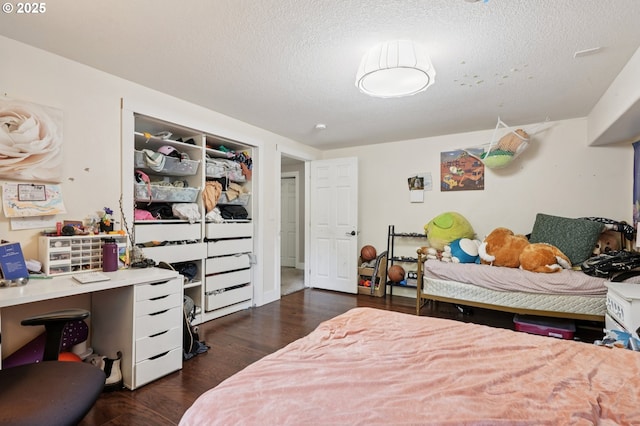 1612 12th St, Oregon City, OR 97045 - bedroom featuring a textured ceiling, an office area, and dark wood-style flooring
