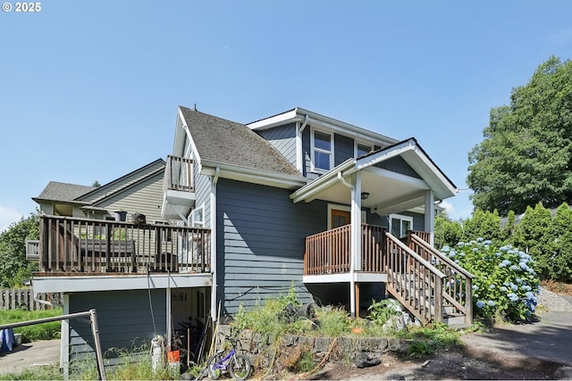 1612 12th St, Oregon City, OR 97045 - view of front of house with a shingled roof, covered porch, and stairs