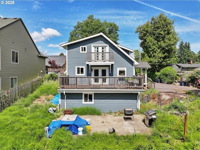 1612 12th St, Oregon City, OR 97045 - rear view of house featuring french doors, a balcony, and a patio area