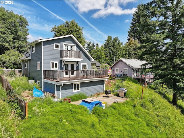 1612 12th St, Oregon City, OR 97045 - back of property with french doors, a balcony, a patio, and a wooden deck