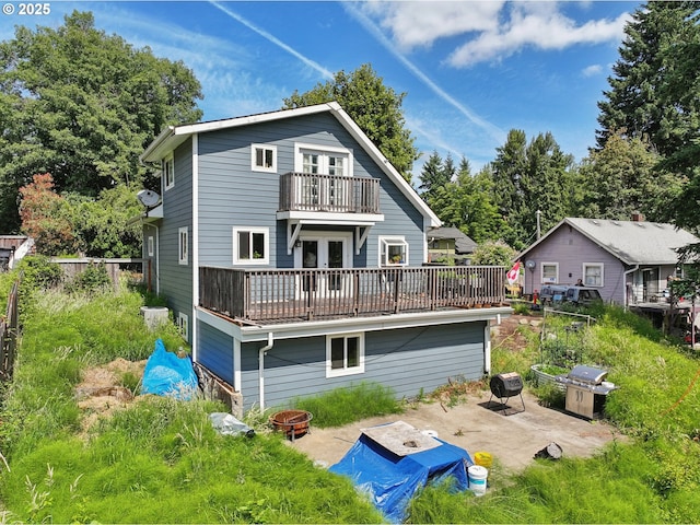 1612 12th St, Oregon City, OR 97045 - back of house with a fire pit, french doors, a balcony, and a patio