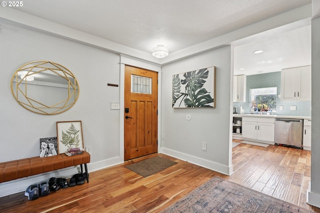 1612 12th St, Oregon City, OR 97045 - foyer with light wood-type flooring and baseboards