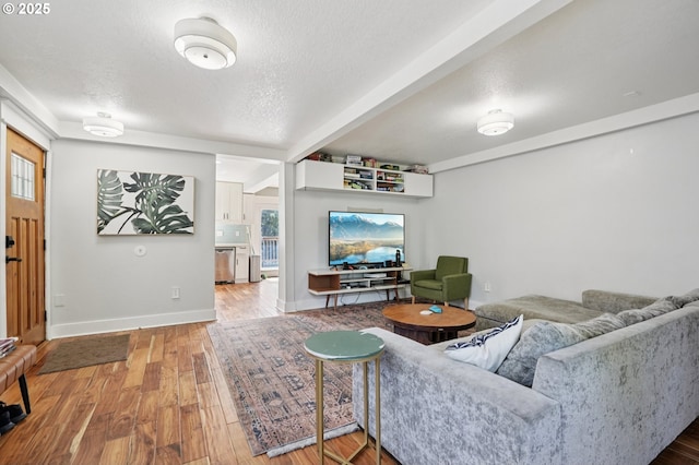 1612 12th St, Oregon City, OR 97045 - living area with a textured ceiling, wood finished floors, and beamed ceiling