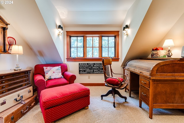 carpeted office space featuring vaulted ceiling