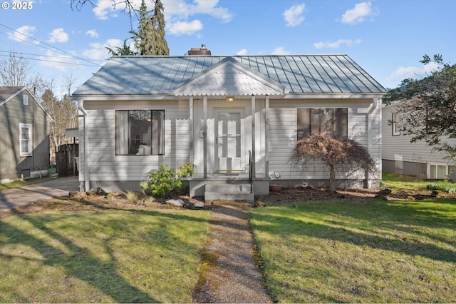 bungalow with a front yard