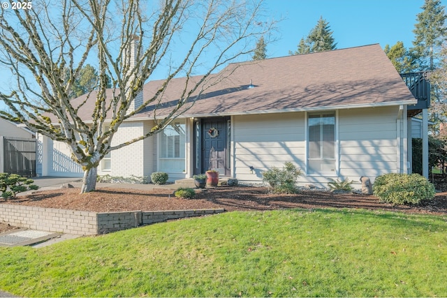 view of front of house with a front lawn