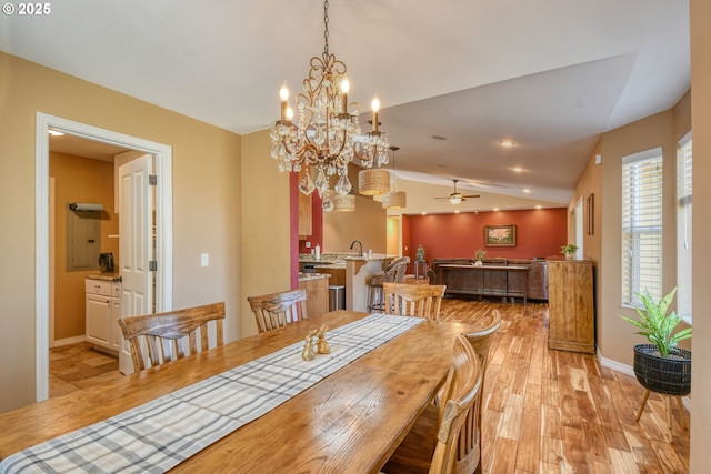 755 NW 23rd St, Pendleton, OR 97801 - dining room with light wood-style flooring, lofted ceiling, ceiling fan, and a chandelier
