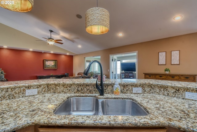 755 NW 23rd St, Pendleton, OR 97801 - kitchen featuring lofted ceiling, light stone counters, recessed lighting, ceiling fan, and open floor plan