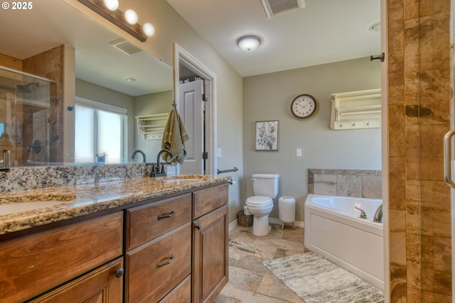 755 NW 23rd St, Pendleton, OR 97801 - full bathroom featuring double vanity, a stall shower, and a garden tub