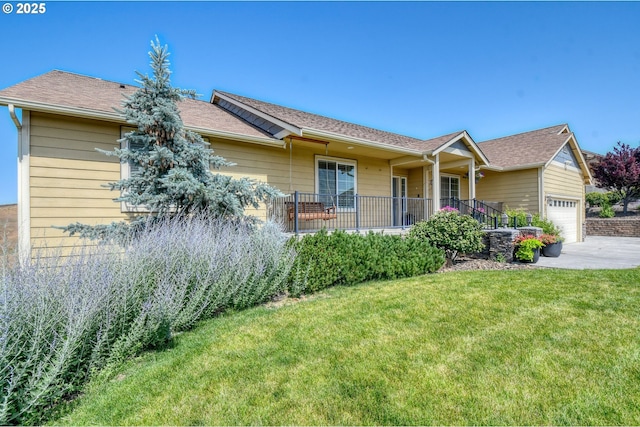 755 NW 23rd St, Pendleton, OR 97801 - ranch-style home featuring a front lawn, a garage, concrete driveway, and a shingled roof