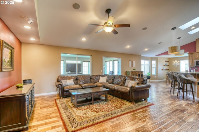 755 NW 23rd St, Pendleton, OR 97801 - living area with light wood finished floors, vaulted ceiling, a ceiling fan, a chandelier, and recessed lighting