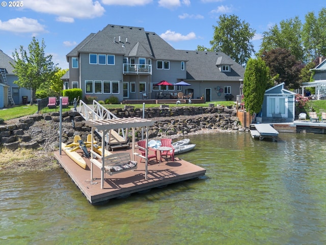 dock area with a water view