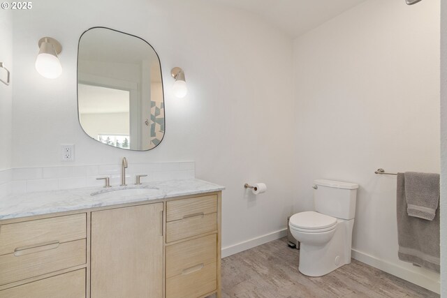 2780 Spring Blvd, Eugene, OR 97403 - bathroom featuring vanity and wood finished floors