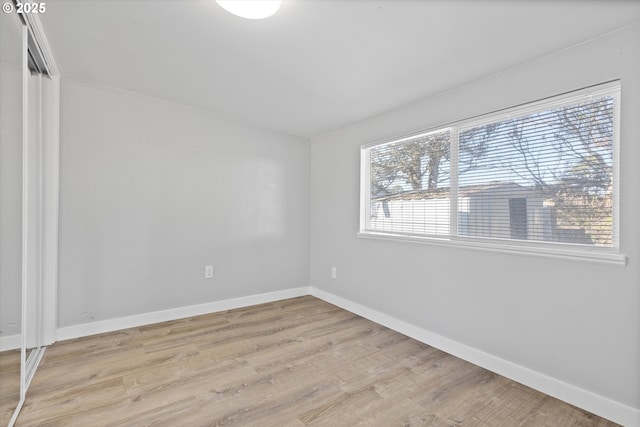 empty room featuring light hardwood / wood-style floors