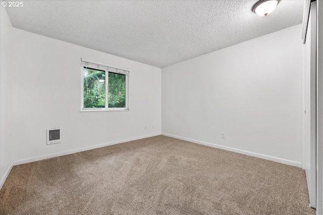 12618 NW Barnes Rd Unit 11, Portland, OR 97229 - carpeted spare room with a textured ceiling