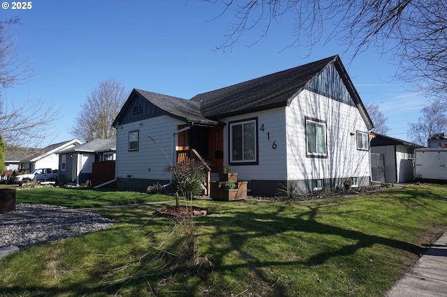 view of property exterior with a yard