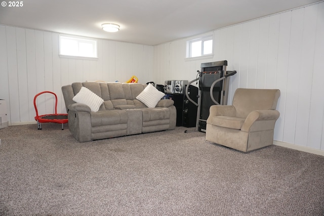 living room with carpet floors and a healthy amount of sunlight