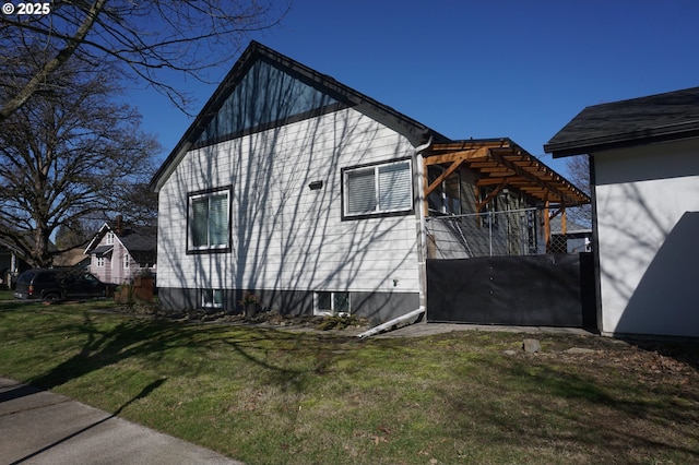 view of home's exterior featuring a yard