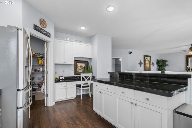 3801 NE 93rd St, Vancouver, WA 98665 - kitchen with stainless steel fridge with ice dispenser, ceiling fan, white cabinetry, recessed lighting, and dark wood-style flooring