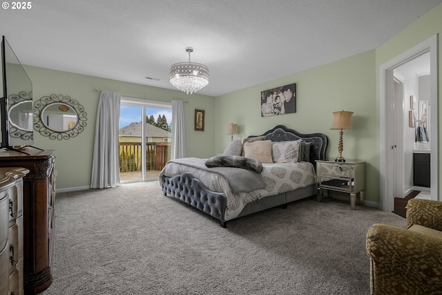 3801 NE 93rd St, Vancouver, WA 98665 - bedroom featuring access to exterior, carpet, a notable chandelier, and baseboards