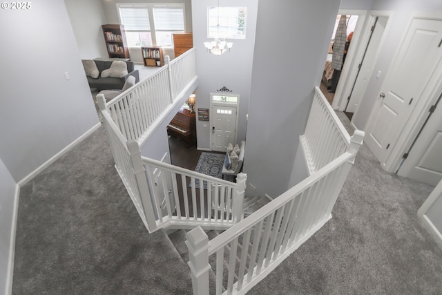 3801 NE 93rd St, Vancouver, WA 98665 - staircase with a chandelier, carpet, and baseboards