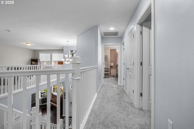 3801 NE 93rd St, Vancouver, WA 98665 - hallway with visible vents, an inviting chandelier, and carpet
