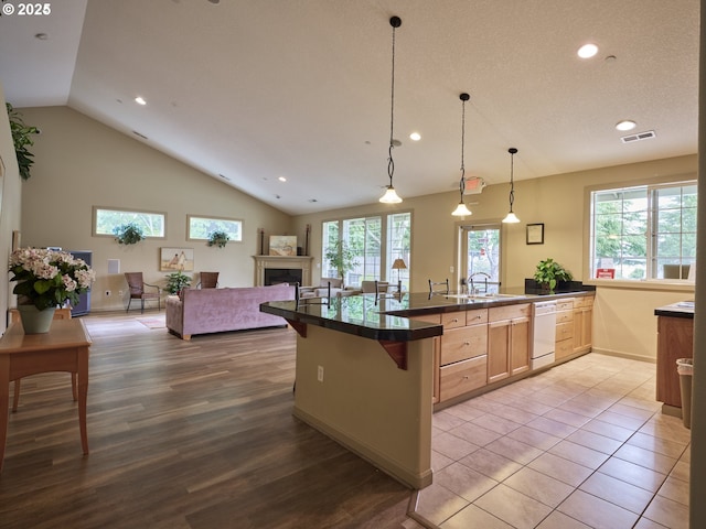 3801 NE 93rd St, Vancouver, WA 98665 - kitchen featuring visible vents, recessed lighting, dark countertops, and vaulted ceiling