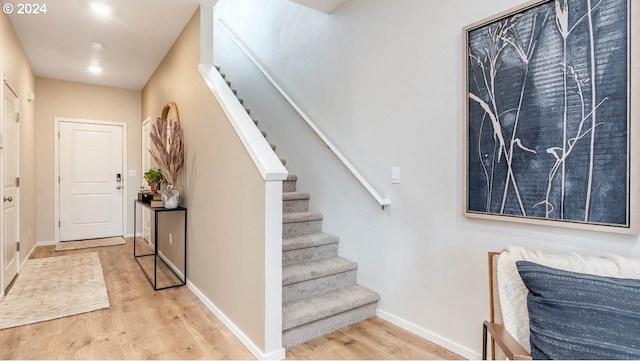 foyer entrance with wood-type flooring