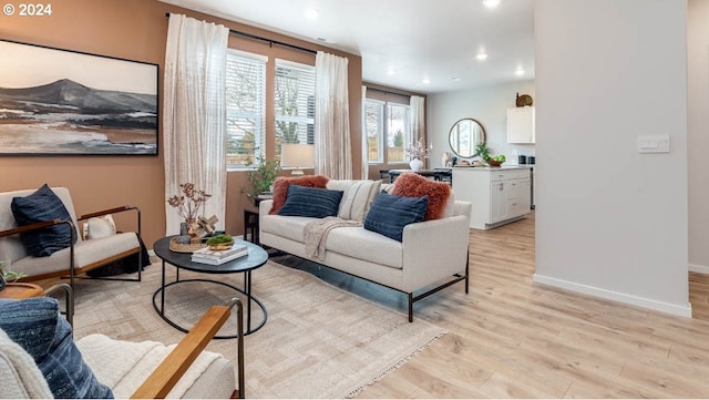 living room with light hardwood / wood-style floors