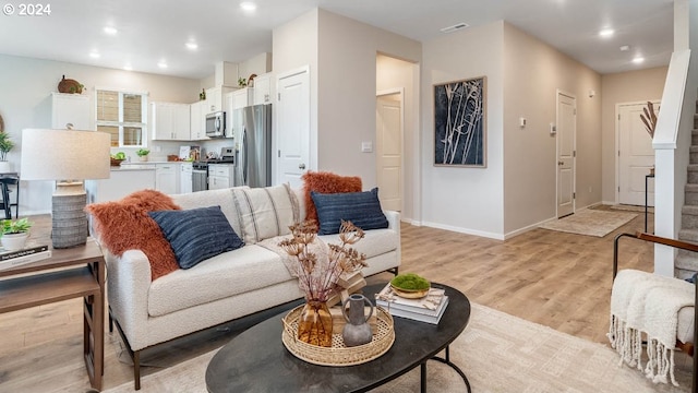 living room featuring light hardwood / wood-style flooring