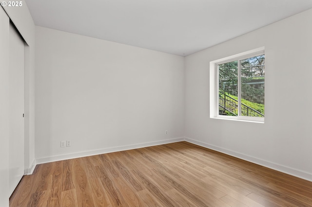 interior space with light wood-type flooring and baseboards