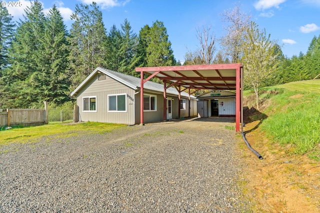 95116 Marcola Rd, Marcola, OR 97454 - view of front of home featuring driveway, a carport, and fence