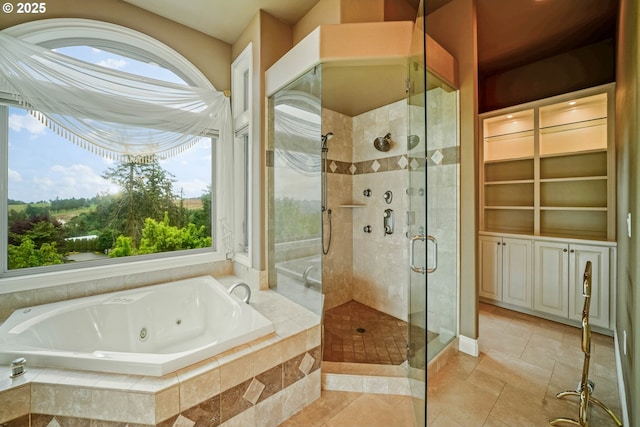 12033 S Shadow Hills Ct, Turner, OR 97392 - full bath featuring a jetted tub, a shower stall, and tile patterned floors
