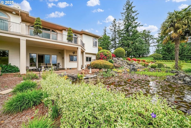 12033 S Shadow Hills Ct, Turner, OR 97392 - rear view of property featuring a balcony and a patio