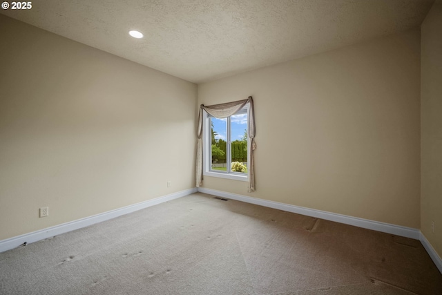 12033 S Shadow Hills Ct, Turner, OR 97392 - carpeted empty room with baseboards, a textured ceiling, and recessed lighting