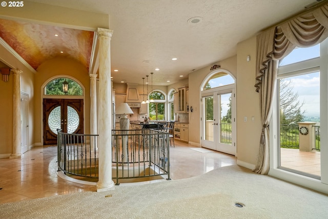 12033 S Shadow Hills Ct, Turner, OR 97392 - entrance foyer featuring french doors, recessed lighting, light tile patterned floors, vaulted ceiling, and baseboards