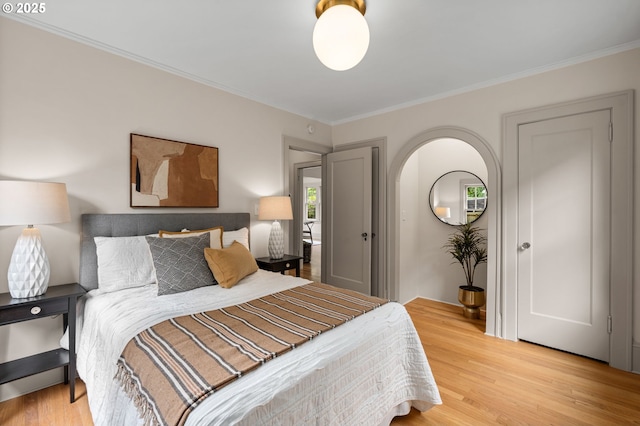 2815 NE 35th Ave, Portland, OR 97212 - bedroom with crown molding and light wood-style floors