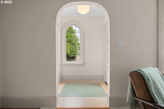 2815 NE 35th Ave, Portland, OR 97212 - interior space featuring arched walkways, baseboards, crown molding, and wood finished floors