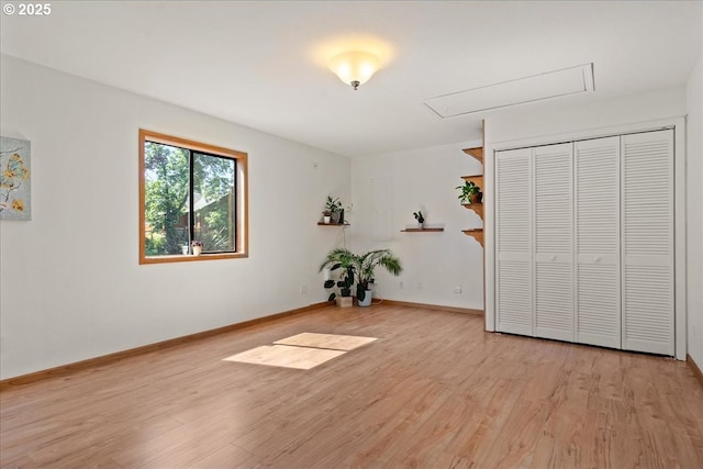 115 Willow St, Silverton, OR 97381 - unfurnished bedroom with attic access, light wood-style flooring, and a closet