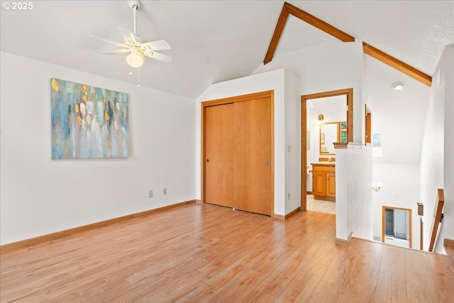 115 Willow St, Silverton, OR 97381 - unfurnished bedroom featuring lofted ceiling, light wood-style floors, a closet, ensuite bath, and ceiling fan