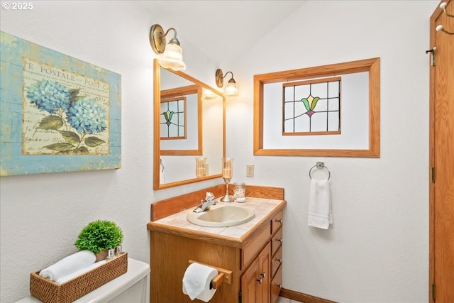 115 Willow St, Silverton, OR 97381 - half bathroom featuring vanity and lofted ceiling