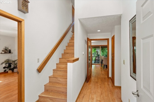 115 Willow St, Silverton, OR 97381 - hall with light wood-style floors and stairs