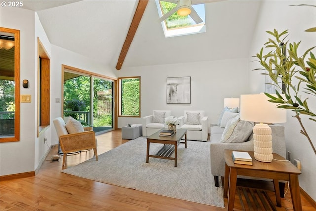 115 Willow St, Silverton, OR 97381 - living area with a skylight, healthy amount of natural light, and wood finished floors