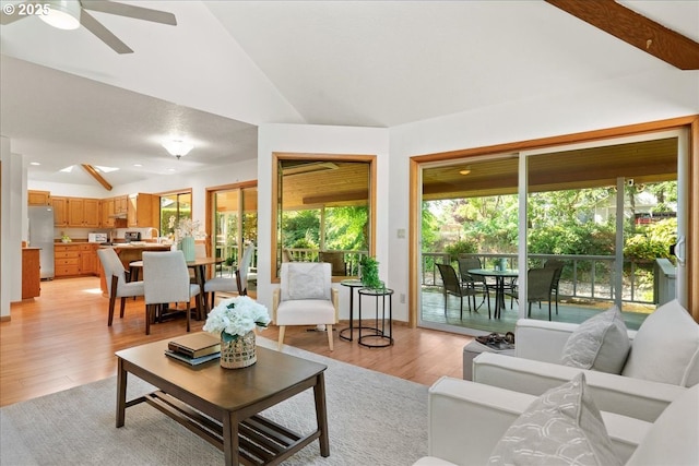 115 Willow St, Silverton, OR 97381 - living room featuring vaulted ceiling, a ceiling fan, light wood-style floors, and recessed lighting
