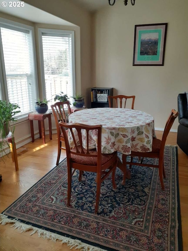 1347 NE Paloma Ave, Gresham, OR 97030 - dining space featuring baseboards and wood finished floors