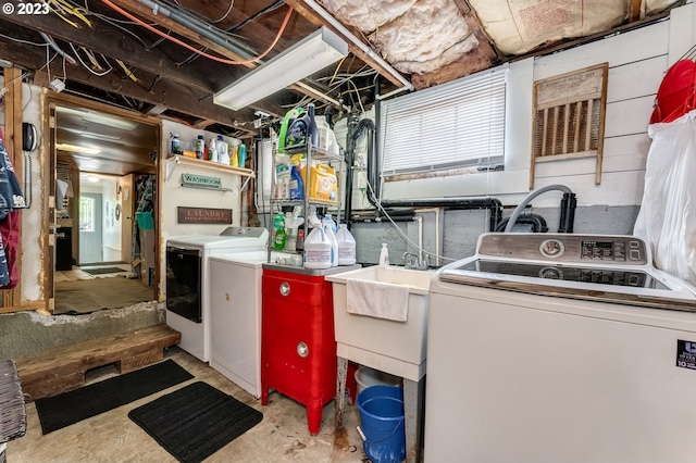 laundry room featuring laundry area and washing machine and clothes dryer