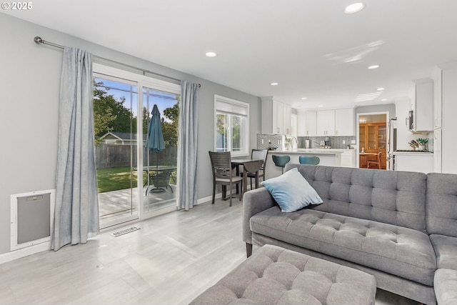 5355 SW 205th Ct, Beaverton, OR 97078 - living room featuring recessed lighting and baseboards